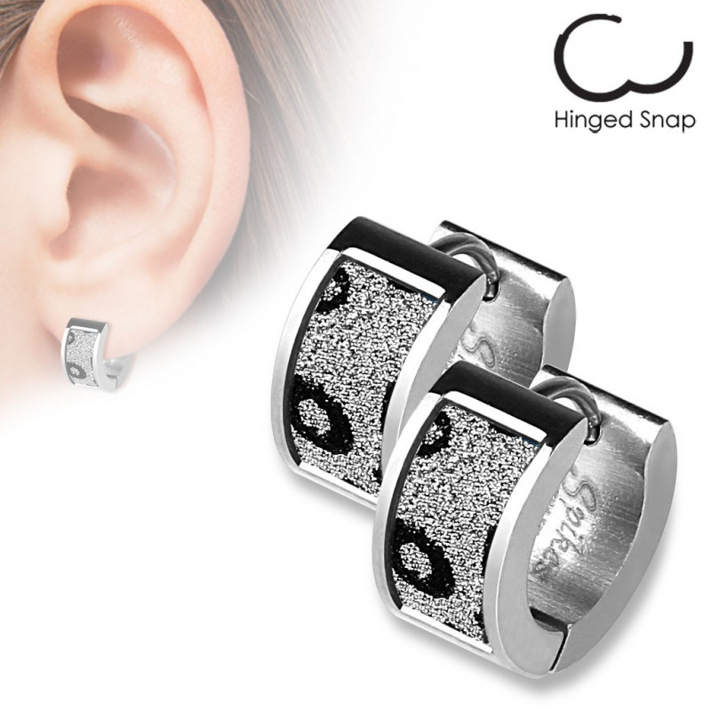 Boucle anneau acier avec motifs léopards scintillants Xaq Bijoux7,49 €